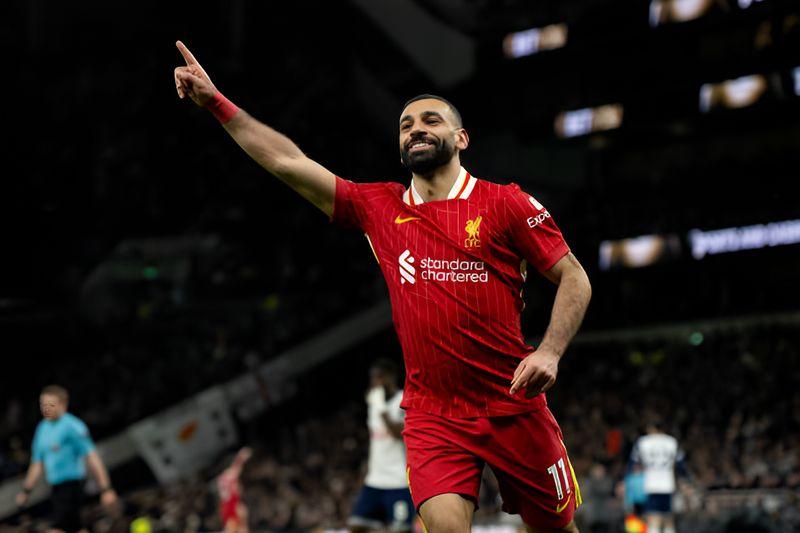 Mo Salah expressed pride in setting the Premier League record but admitted Liverpool must improve defensively after conceding three goals
