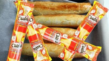 Popular Nigerian childhood snacks including Gala sausage rolls, La Casera, chin chin, boli, puff-puff and groundnuts, evoking memories of school days and neighbourhood treats.