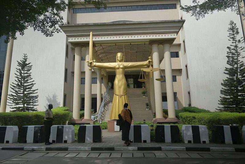 Federal High Court Abuja building where blogger was remanded in DSS custody over viral military claim case