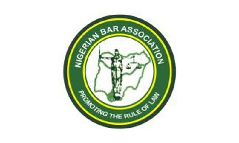 Afam Osigwe speaking at legal masterclass event in Abuja on law firm restructuring