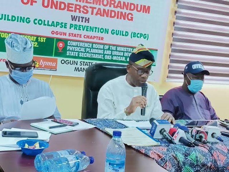 Ogun State Commissioner Olatunji Odunlami speaking at a stakeholders' meeting on construction insurance. 
