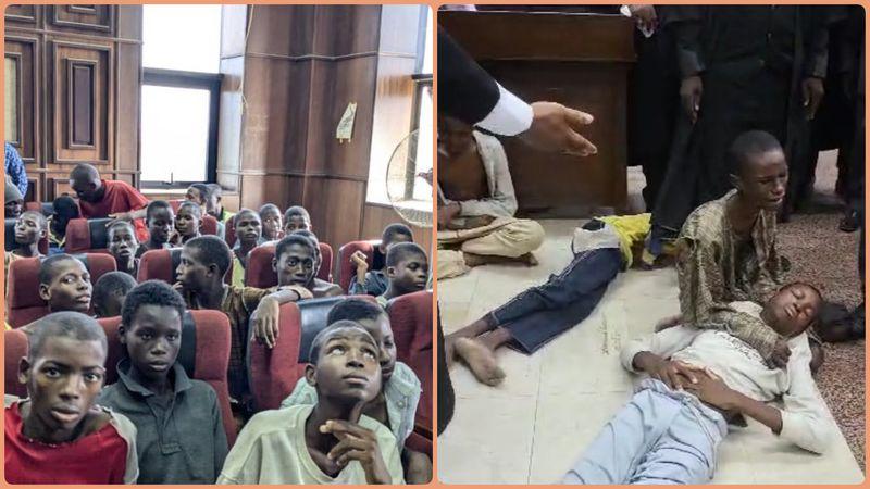 Image of teenagers lying on the floor of a courtroom during their arraignment in Abuja.
