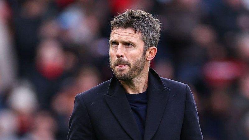 Manchester United players celebrating their 2-1 victory over Crystal Palace under head coach Michael Carrick.