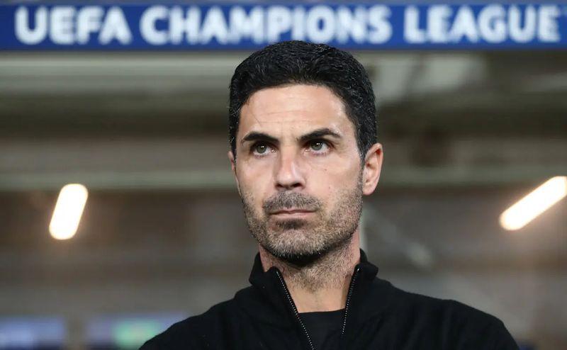 Mikel Arteta standing on the touchline at the Emirates Stadium during Arsenal’s Champions League match against Sporting CP.