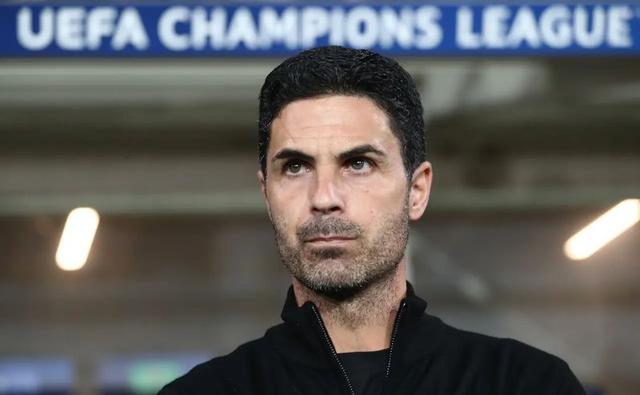 Mikel Arteta standing on the touchline at the Emirates Stadium during Arsenal’s Champions League match against Sporting CP.