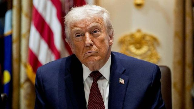 Diplomats reviewing documents on the US-Iran 15-point proposal, aimed at resolving nuclear and regional tensions.