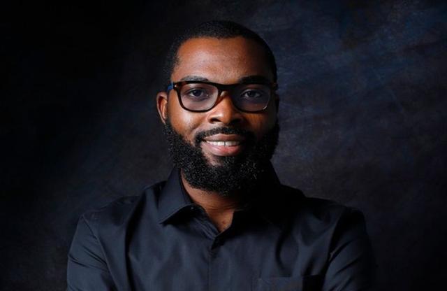 Sheriff Adedokun, CEO of Clea, in a black shirt and glasses.