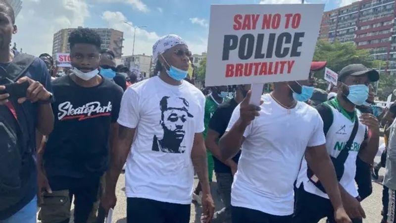 Demonstrators at the Lekki Toll Gate in remembrance of #EndSARS victims.
