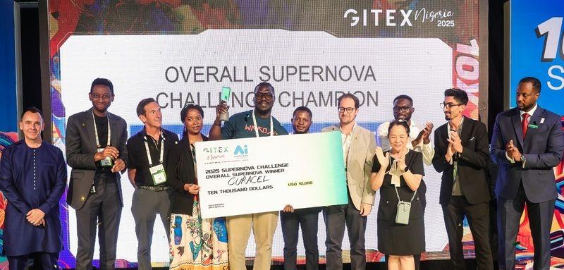 GITEX Nigeria 2025 Supernova Challenge winners and presenters on stage with an award cheque