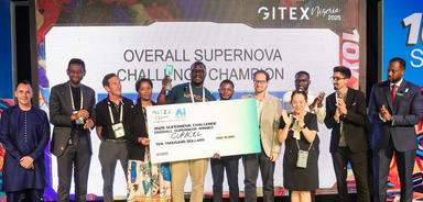 GITEX Nigeria 2025 Supernova Challenge winners and presenters on stage with an award cheque