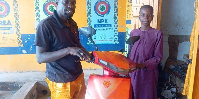 Hussaini Isa repairs electric motorcycles in Gombe, Nigeria.