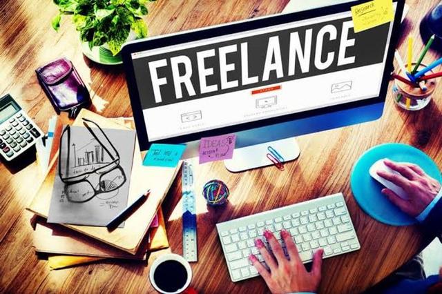 A Nigerian freelancer comparing Upwork, Fiverr, Toptal, Contra and LinkedIn on a laptop while searching for remote work opportunities.