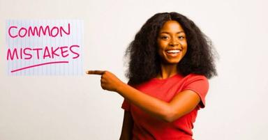 Young Nigerian entrepreneur reviewing business plans and finances while launching a small business.