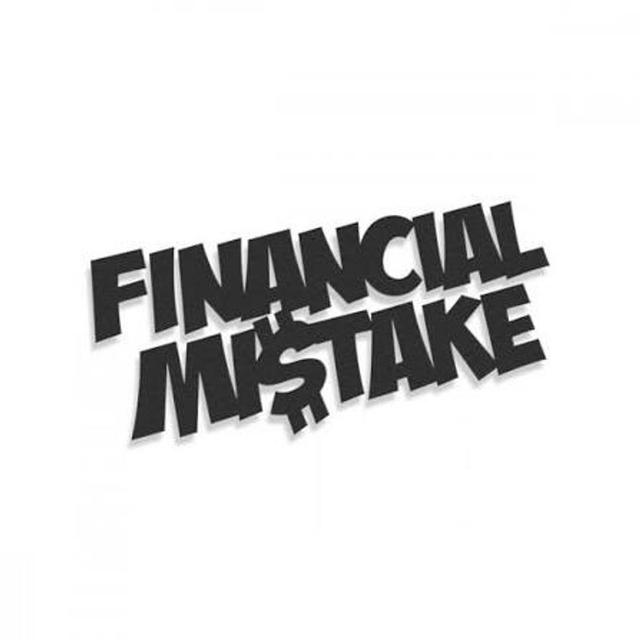 Young professional budgeting finances with a calculator, savings jar, laptop and investment charts on a desk.