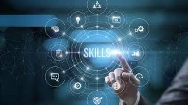 Young professionals using laptops and digital tools while collaborating on data analysis, cybersecurity, AI and digital marketing tasks in a modern office environment.