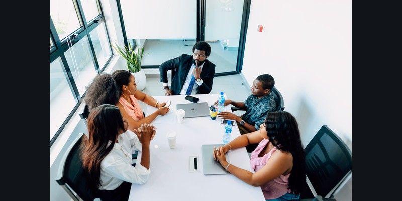 Nigerian business professionals collaborating in a Lagos office.