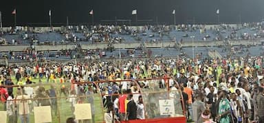 Fans invade the pitch during Rangers and Enyimba league showdown