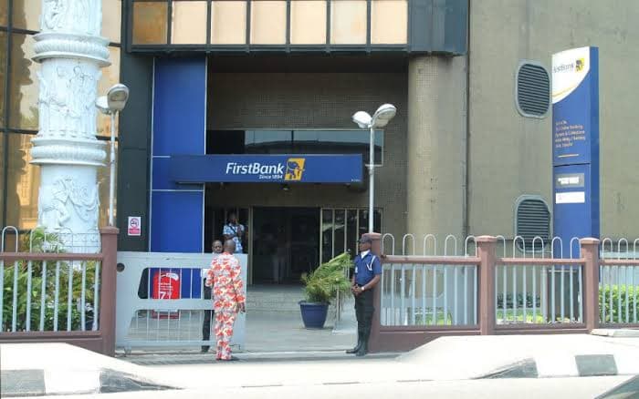 First Bank sacked over 100 staff members after one Tijani Muiz Adeyinka allegedly orchestrated a N40 billion fraud. 