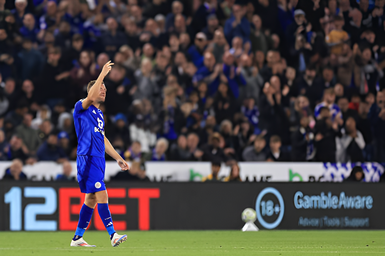 Jamie Vardy gestures towards Tottenham fans