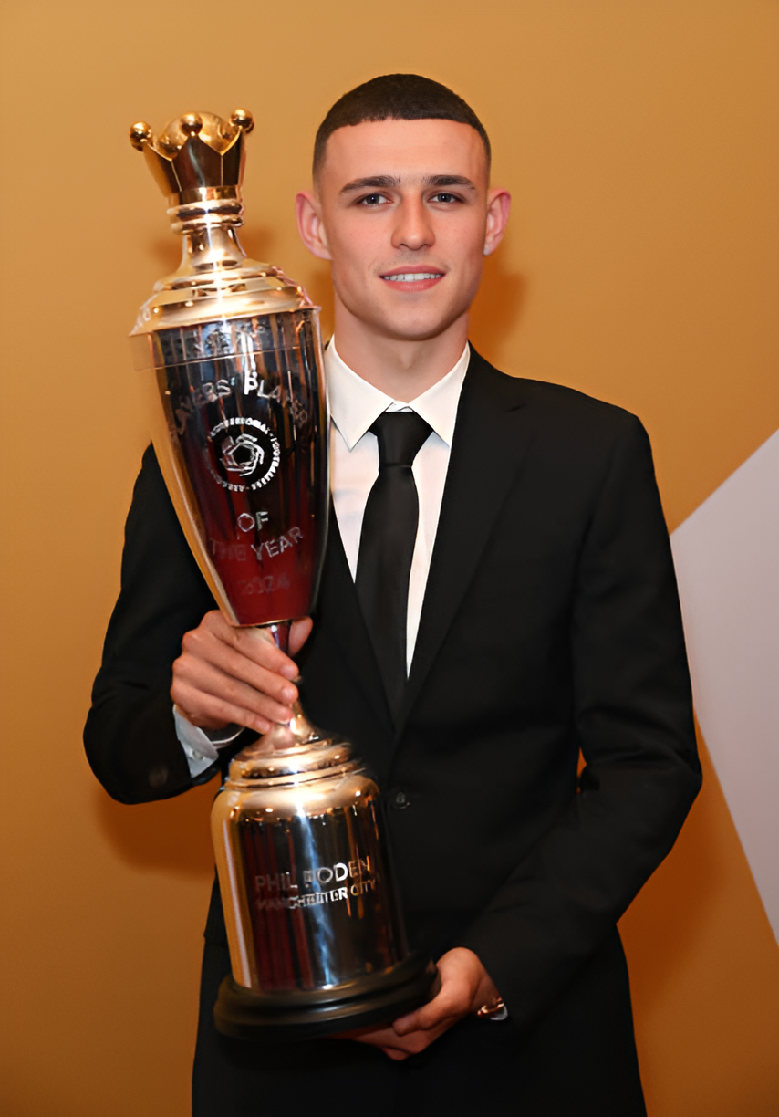 Phil Foden holds the PFA Players's Player award for the 2023/2024 session