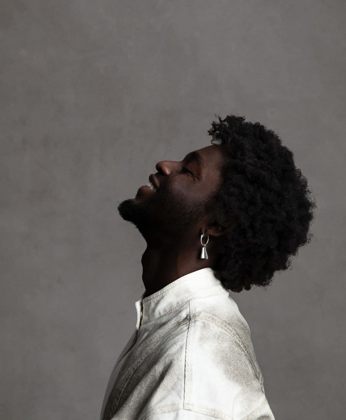 14 tracks from Omah Lay’s Boy Alone debut and corresponding total streams on Spotify 
