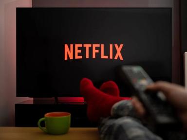 A Nigerian viewer browsing Netflix on a smart TV, exploring international films alongside Nollywood productions.