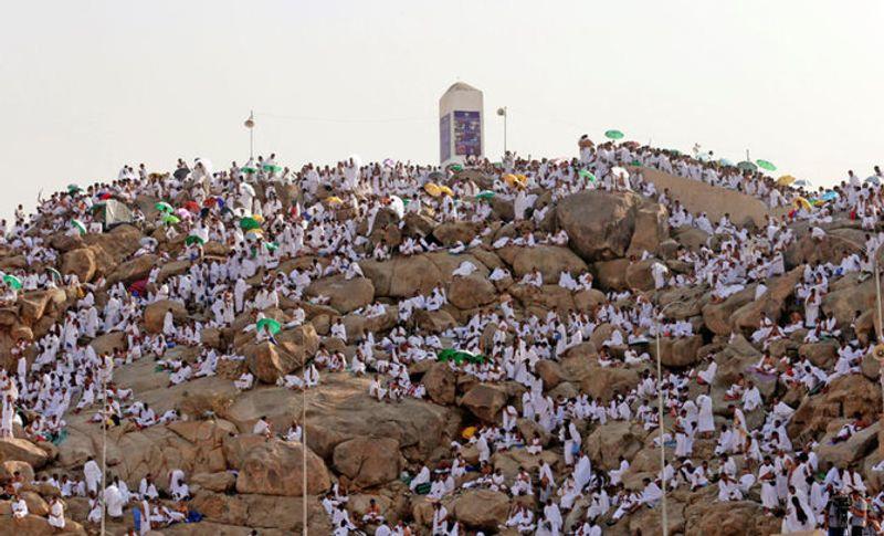 Muslim pilgrims gathered near Mount Arafat during Hajj preparations ahead of Eid-al-Adha in Saudi Arabia.