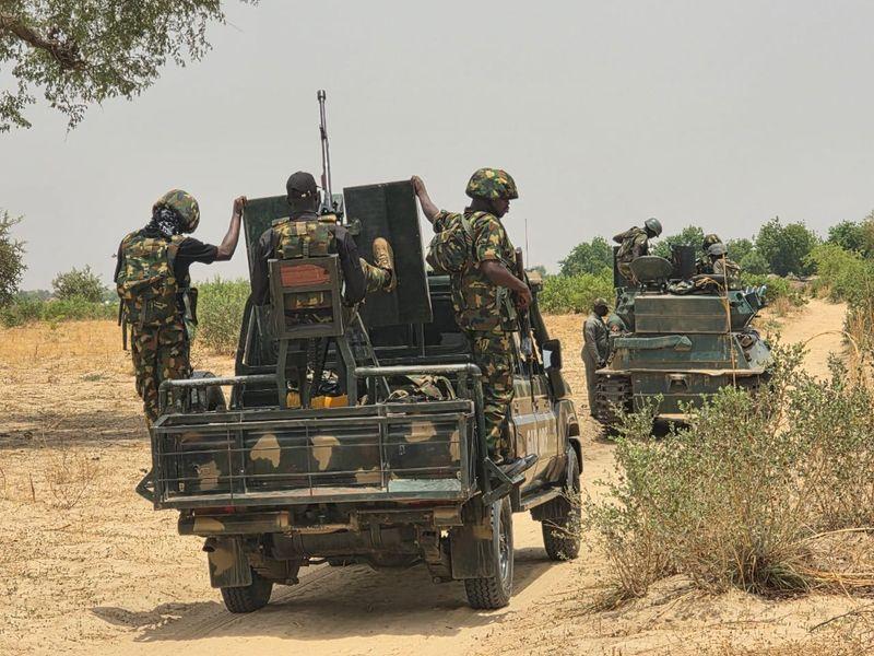 General Taoreed Shuaibu addressing troops of the Joint Task Force – Operation Enduring Peace at an Eid‑el-Fitr luncheon in Jos, praising their commitment to safeguarding lives and national security.