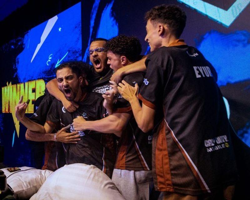 Players celebrating on stage at the 2025 Carry1st Africa Cup finals.