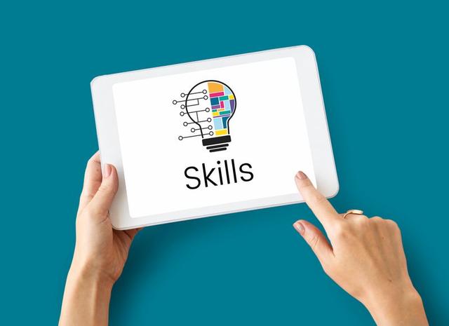 Nigerians learning digital skills on laptops and smartphones, including AI, digital marketing, content creation, data analysis and online communication.