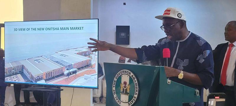 Governor Chukwuma Soludo addressing traders and stakeholders on the remodelling of Onitsha Main Market in Awka.